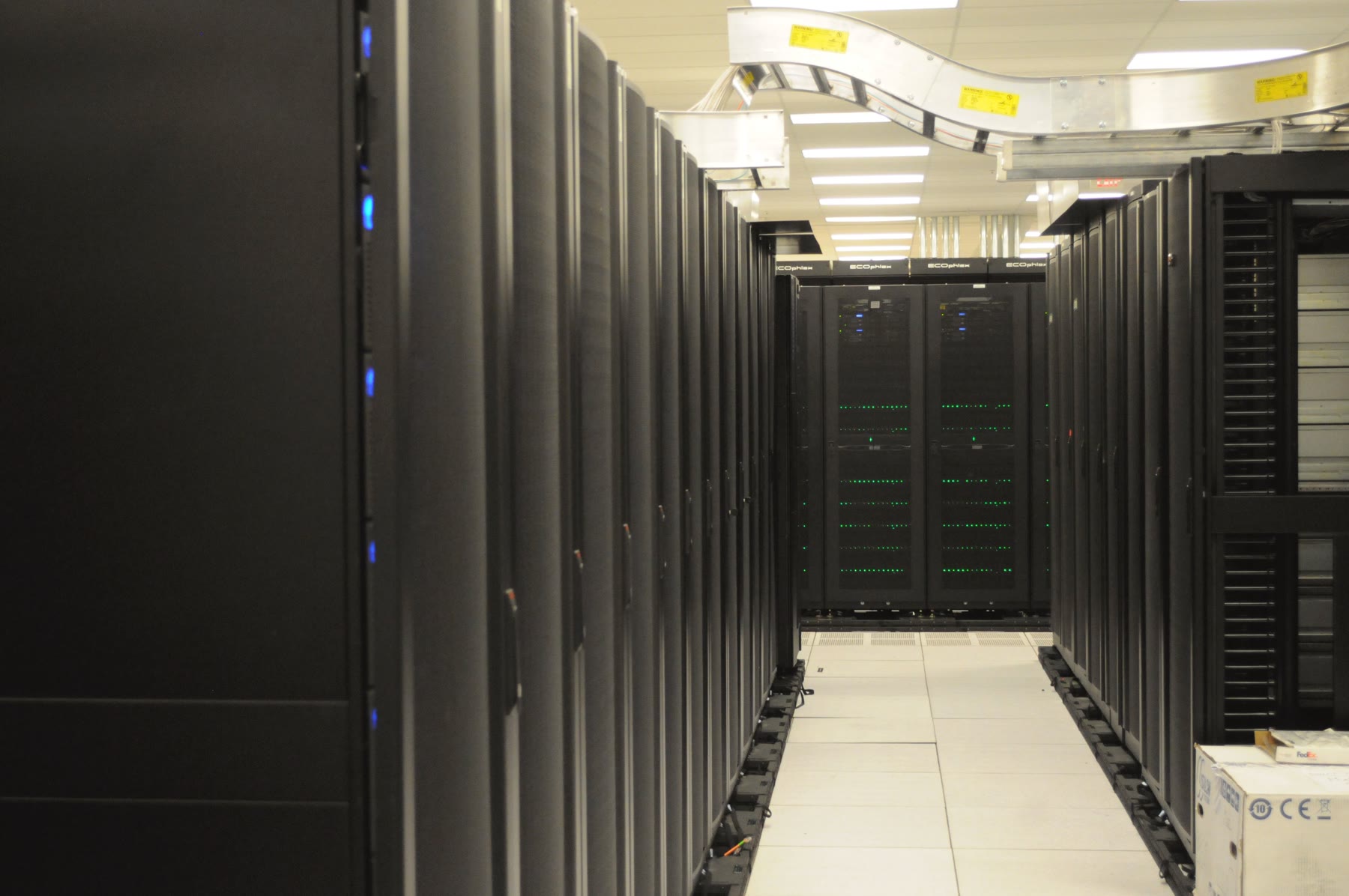 Rows of high-performance computing server racks at NERSC.